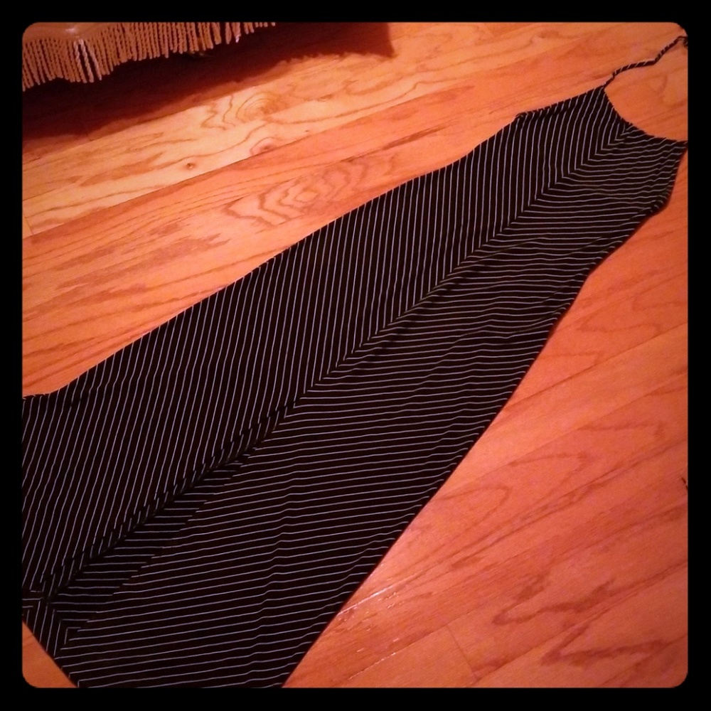 Black halter dress w/thin white diagonal stripes